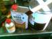 1988 Ford C-350 (Centurion Conversions) - Paint supplies including Dupont reducer and a can of enamel paint are arranged on a workbench.