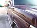 1988 Ford C-350 (Centurion Conversions) - Side view of a 1988 Ford C-350 (Centurion Conversions) showing the fender, door, and hood.