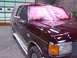 1988 Ford C-350 (Centurion Conversions) - Ford C-350 undergoing paint work, with protective plastic covering the front windshield and roof.
