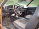 1970 Mercury Cyclone - The interior of a 1970 Mercury Cyclone, a vintage dashboard and patterned seats.