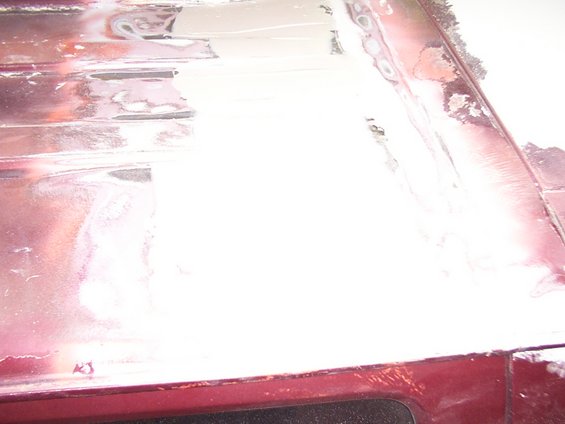 Roof panel with body filler and primer
