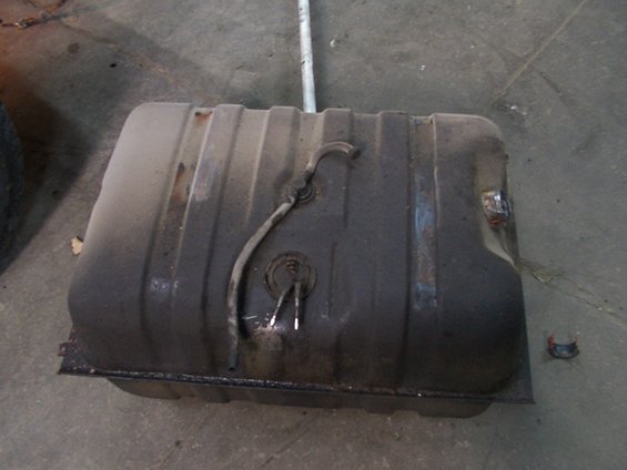 Fuel tank with fuel pump assembly attached