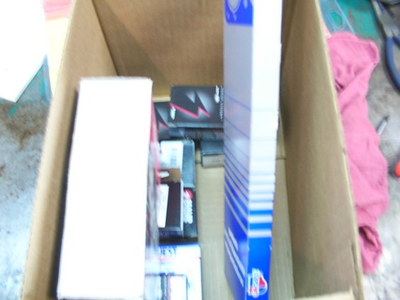 Box of parts with blue and white packaging