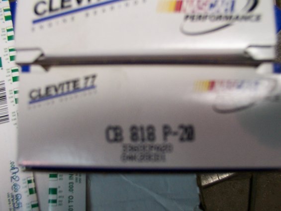 Boxes of Clevite 77 engine bearings with part number CB 818 P-20 visible