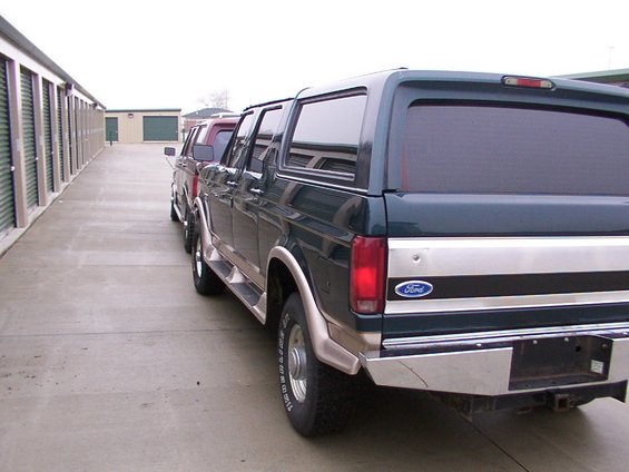 1988 Ford C-350 (Centurion Conversions) rear view, parked next to another van