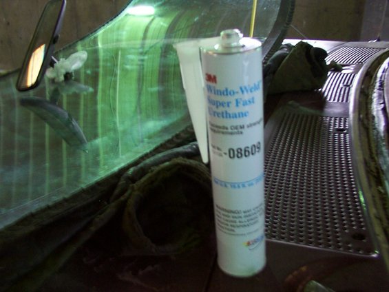 3M Wind-Weld Super Fast Urethane sealant tube near windshield