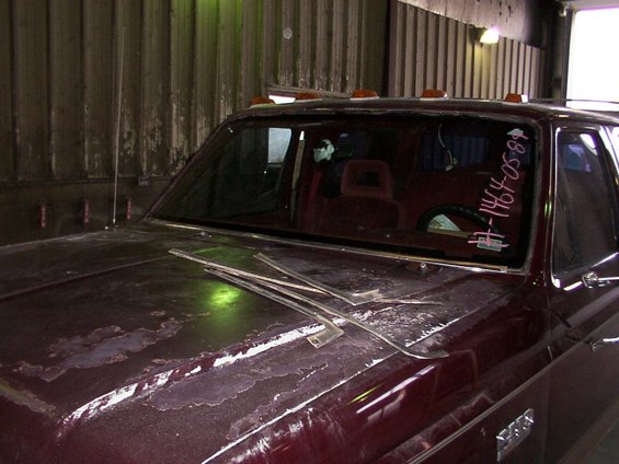 1988 Ford C-350 (Centurion Conversions) hood with peeling paint and windshield with handwritten markings