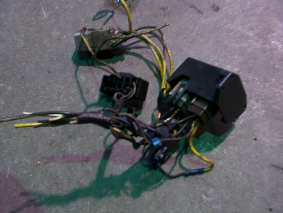 Wiring harness and electrical components on a grey surface