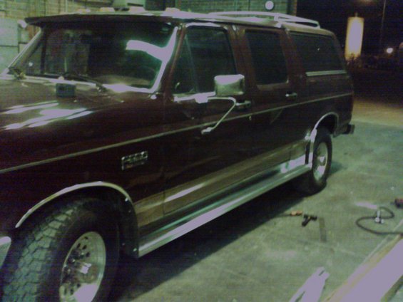 Maroon 1988 Ford C-350 Centurion Conversions SUV, 3q-front view