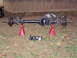 1989 Ford F-250 - Rear axle assembly from a Ford F-250, removed and supported by jack stands.