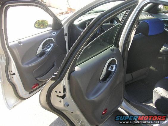 Interior door panel and seats of a 1999 Ford Taurus