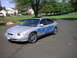 1999 Ford Taurus - Silver 1999 Ford Taurus parked on asphalt with a suburban background.