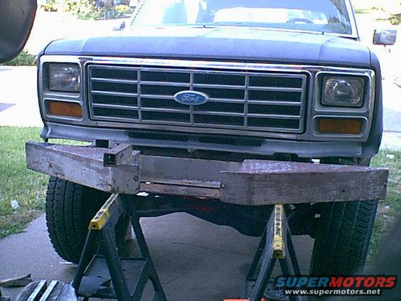 frontdonetrim.jpg with both fenders cut and the correct height spacers this is almost where i i want the bumper to sit. looks good.