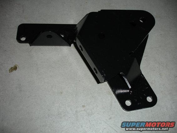 Black metal bracket for a vehicle lift kit, shown on a concrete surface