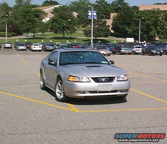 Silver 2000 Ford Mustang parked in a lot, front view