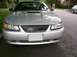 2000 Ford Mustang - Front view of a silver 2000 Ford Mustang, a custom grille and hood scoop.