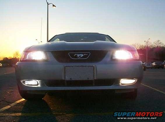2000 Ford Mustang front view with headlights and fog lights on