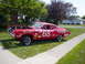 1968 Ford Torino - This red 1968 Ford Torino race car displays various decals and the number 68 on its side.