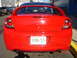 2005 Dodge SRT-4 - Rear view of a red Dodge Neon SRT-4, a prominent spoiler and New Jersey license plates.