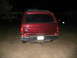 1988 Ford C-350 (Centurion Conversions) - This 1988 Ford C-350 (Centurion Conversions) is seen from the rear, equipped with a camper shell.