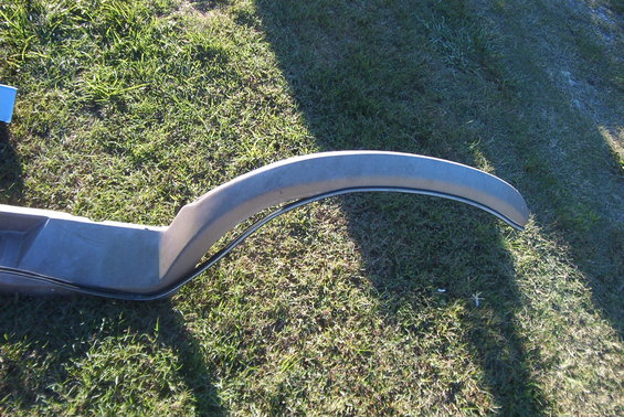 Fender flare lying on grass