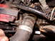 1990 Lincoln Town Car - Pull the upper rad hose off for better access, but I leave the smaller bypass hose on until later, though I slack off it's hose clamp now,…