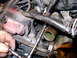 1990 Lincoln Town Car - The upper bolt, on the passenger's side, is easy enough to access using 1/4" drive socket, extension and ratchet, once a wrench has broke i…