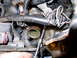 1990 Lincoln Town Car - You can barely catch and tease off the lower, driver's side bolt with the 1/4" drive 1/2" socket, with great effort. Again once the wrench…