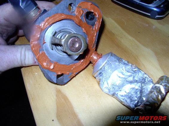 img_0301.jpg More sealant over the terrible quality ROL gasket and slap the whole thing back together.