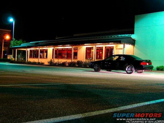 Black 1997 Ford Thunderbird 3q-front view at night