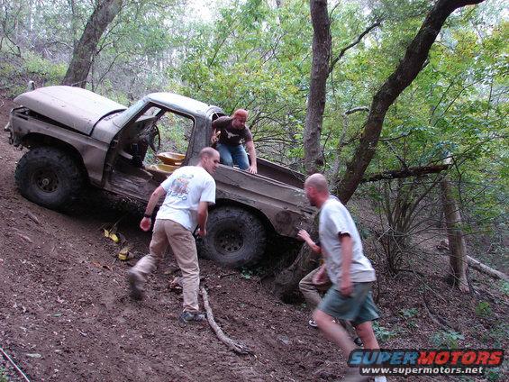 commanche-ridge-101406-019.jpg Frank hit these trees hard after he broke a hub and rear driveshaft trying to go up cajones hill.