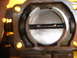 1993 Mazda MX-3 - Throttle body interior showing the butterfly valve and mounting bolts.