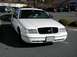 1998 Ford Crown Victoria - Front view of a white 1998 Ford Crown Victoria parked in a lot.
