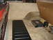 1979 Ford Bronco - Interior view of a vehicle's rear cargo area with an aftermarket audio amplifier installed.