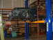 1994 Jeep YJ - This Jeep YJ is on a lift with its front end disassembled for maintenance.