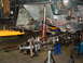 1994 Jeep YJ - Front suspension and steering components of a 1994 Jeep YJ are visible during a repair.