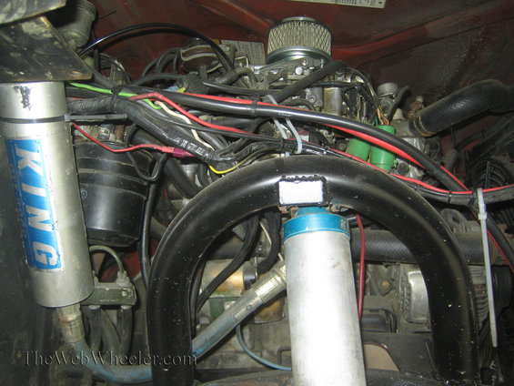 Engine bay with King shocks and aftermarket air filter