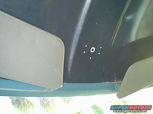 lightsroofmount.jpg I decided to add the light controller to the front roof. this is an easy to reach place and out of the way. I marked the mount holes and drilled for rivets and a wire feed hole.