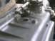 1972 Ford Ranchero - Detail of an engine part, possibly from a vehicle, showing mechanical components.