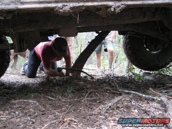 img_2340.jpg hacking the tree under Franks bronco down