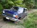 1989 Ford Bronco - This blue 1989 Ford Bronco is stuck in the mud, showing its 3/4 front view.