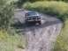 1981 Ford Bronco - My bronco jumping out of a mud hole. Look at the drivers front tire launching off the ground.