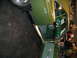1993 Ford Taurus - Custom interior of a green muscle car, a roll cage and multiple gauges.