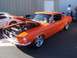 2002 Ford Mustang - This classic Mustang fastback, likely a 1967 model, is displayed with its hood open, revealing the engine compartment.