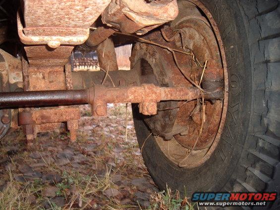 Undercarriage and tire of a rusty vehicle