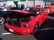 2002 Ford Mustang - A red 2005 Ford Mustang is displayed with its hood open, revealing the engine compartment.