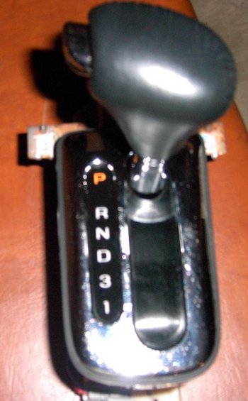 pdrm0145.jpg the 98-02 Conti floor shifter

It is pretty much identical to the 2001  LX Sport, Marauder and LSE shifter units but with some metal mounting tabs on the front

It's also ~1/2" taller!
