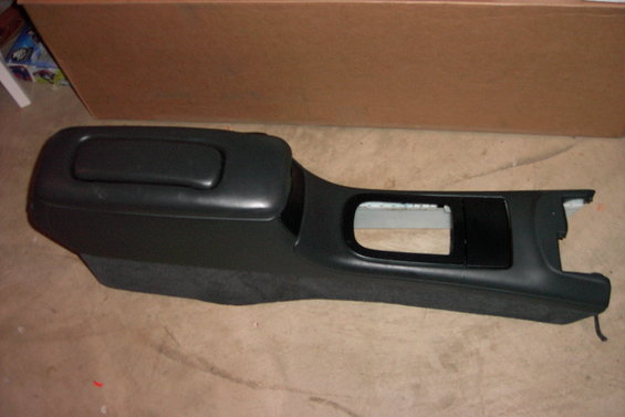 pdrm0146.jpg What I started out with.

A black, dirty console


Follwoing lots of cleaning, I painted it to match the factory Willow Green using custom mixed PPG Interior paint.