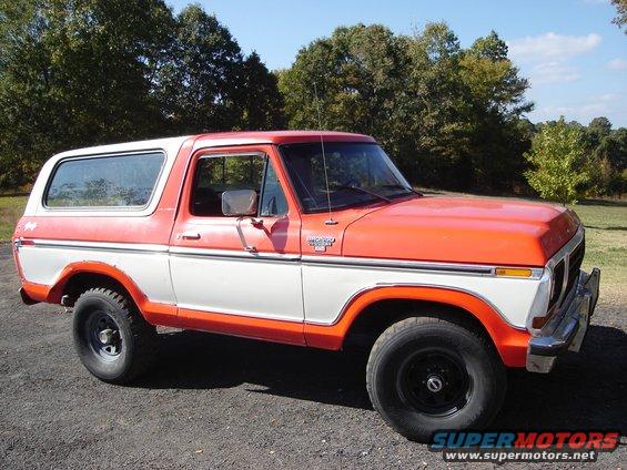 Orange and white 1979 Ford Bronco, 3/4 front view