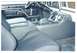 1979 Ford Bronco - The interior of a vehicle is shown, seats, dashboard, and center console details.